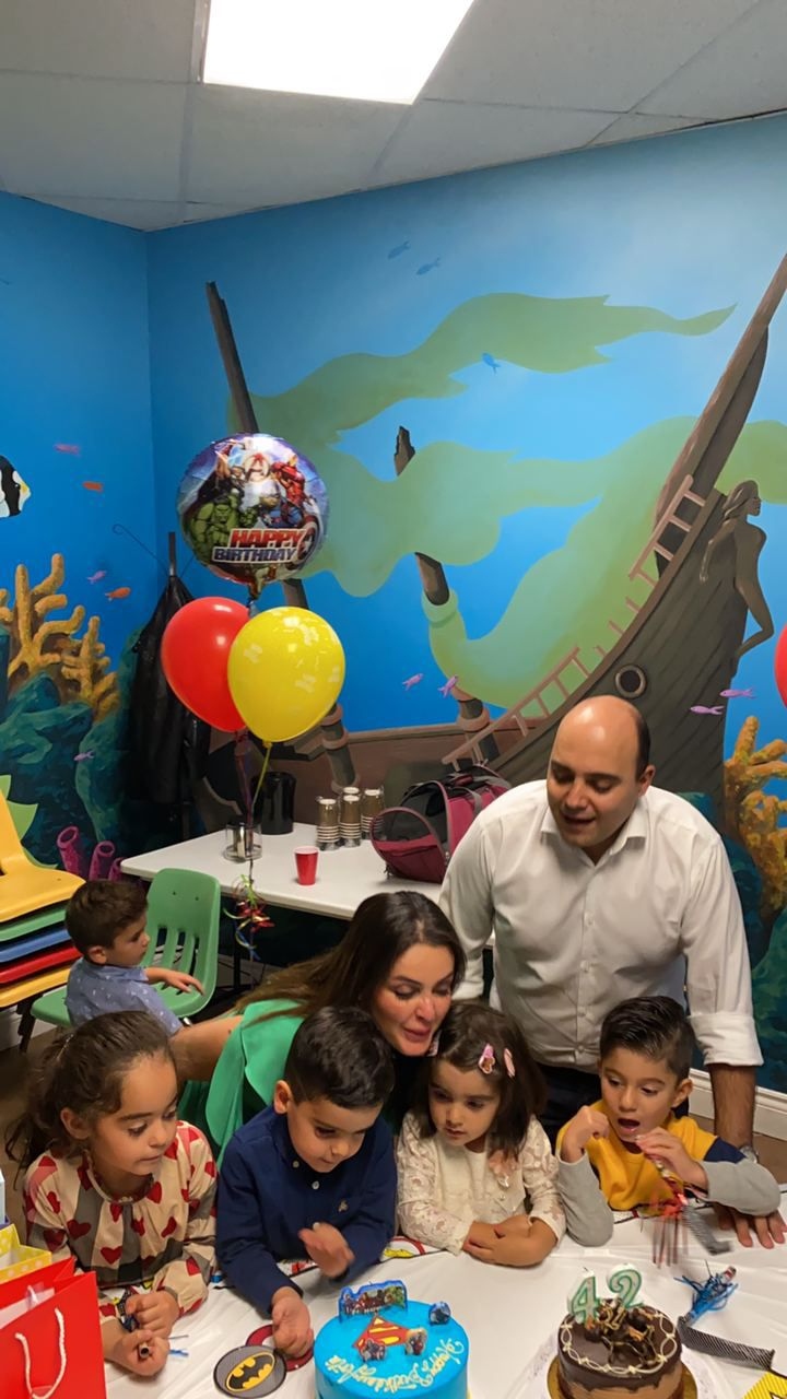 Family celebrating a birthday party at Lazer Runner