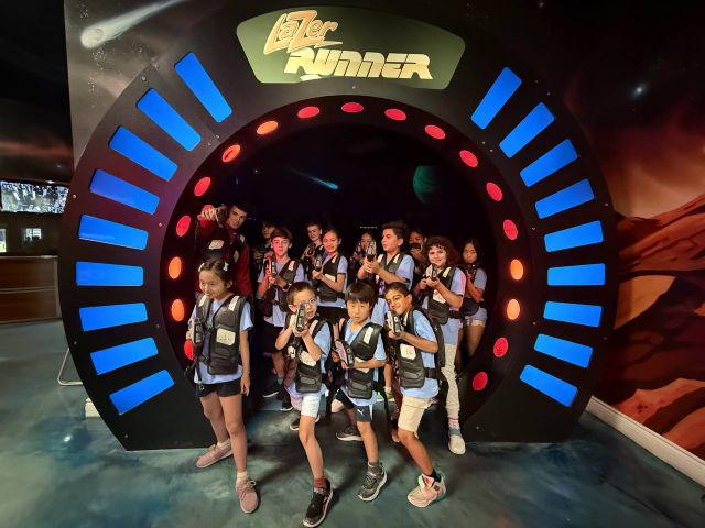 Myung's Taekwondo Academy campers ready for laser tag at Lazer Runner Aurora