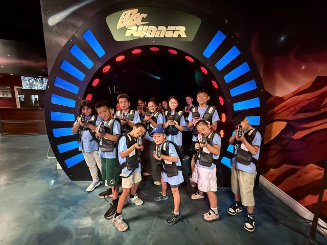 Myung's Taekwondo Academy summer camp group photo in the Lazer Runner arena, Aurora Ontario
